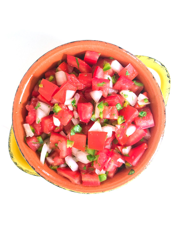 tomatoes, onion, cilantro and seasoning for the best pico de gallo